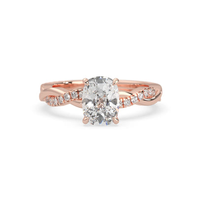 Cushion brilliant lab grown diamond engagement ring with prong setting and twisted pavé diamond band in rose gold tone