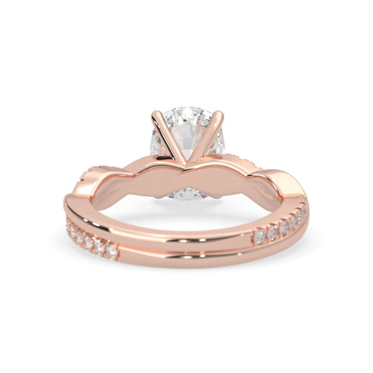 Cushion brilliant lab grown diamond engagement ring with prong setting and twisted pavé diamond band in rose gold tone