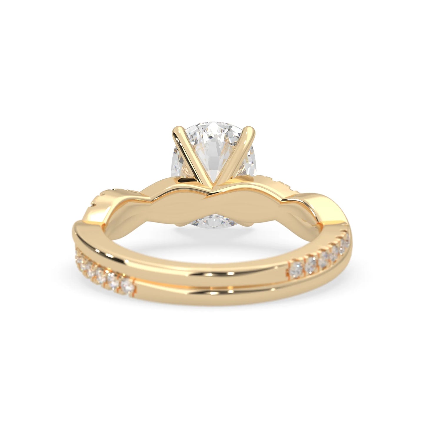 Cushion brilliant lab grown diamond engagement ring with prong setting and twisted pavé diamond band in yellow gold tone