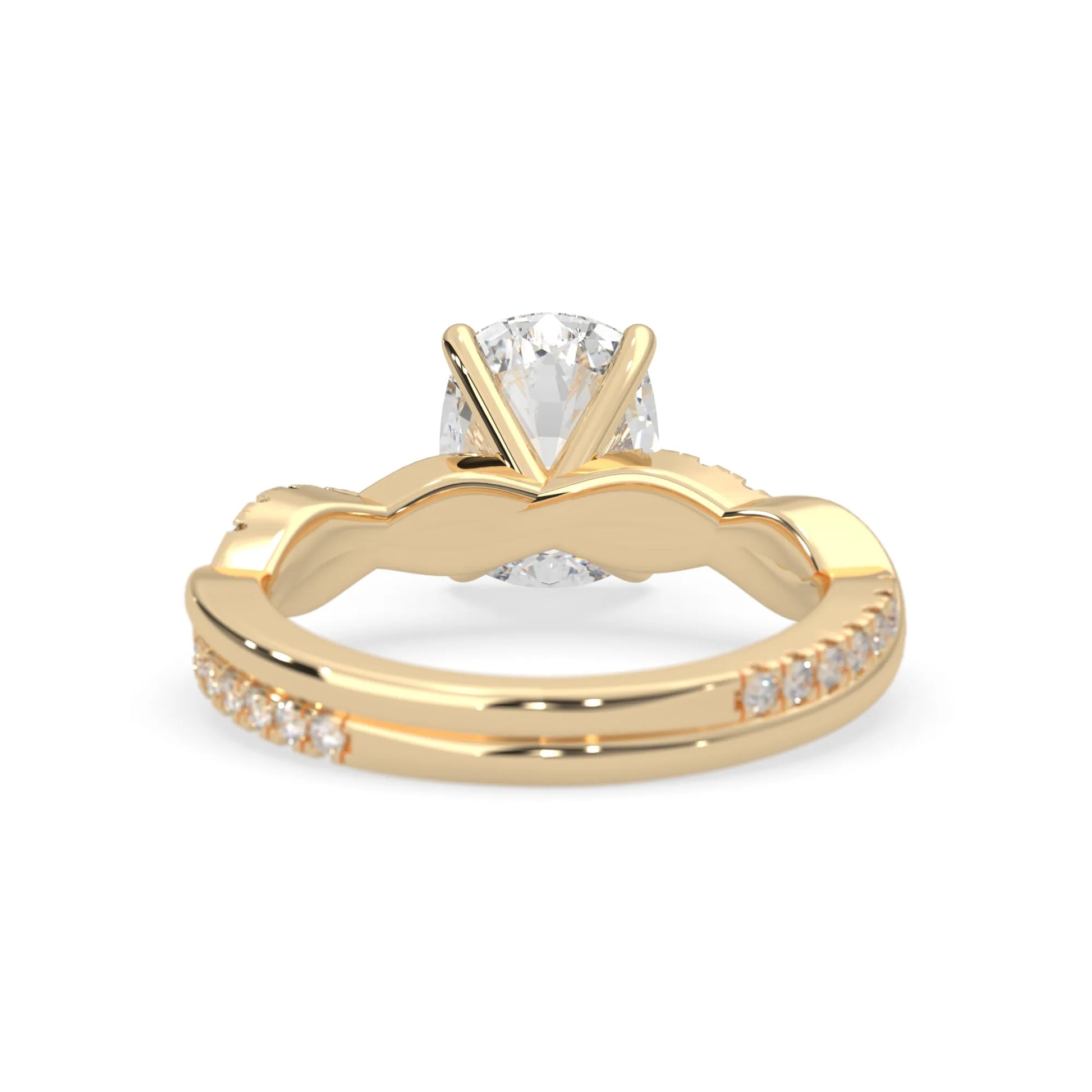 Cushion brilliant lab grown diamond engagement ring with prong setting and twisted pavé diamond band in yellow gold tone