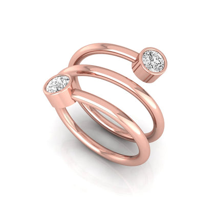 Triple wrap spiral ring featuring two bezel set round brilliant lab grown diamonds in a polished rose gold design
