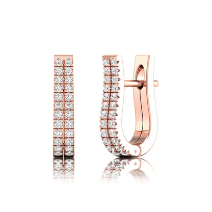 Double row round cut lab grown diamond huggie hoop earrings featuring shared prong set diamonds, hinged snap closure, and polished rose gold finish.