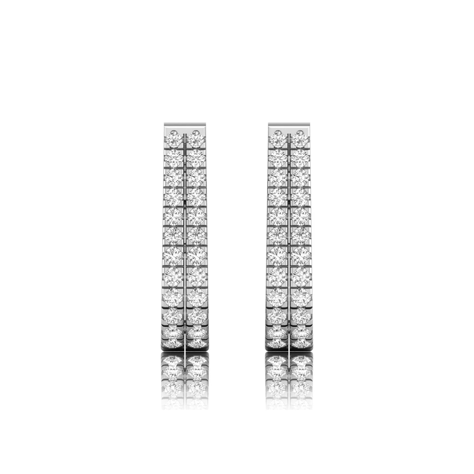 Double row round cut lab grown diamond huggie hoop earrings featuring shared prong set diamonds, hinged snap closure, and polished white gold finish.