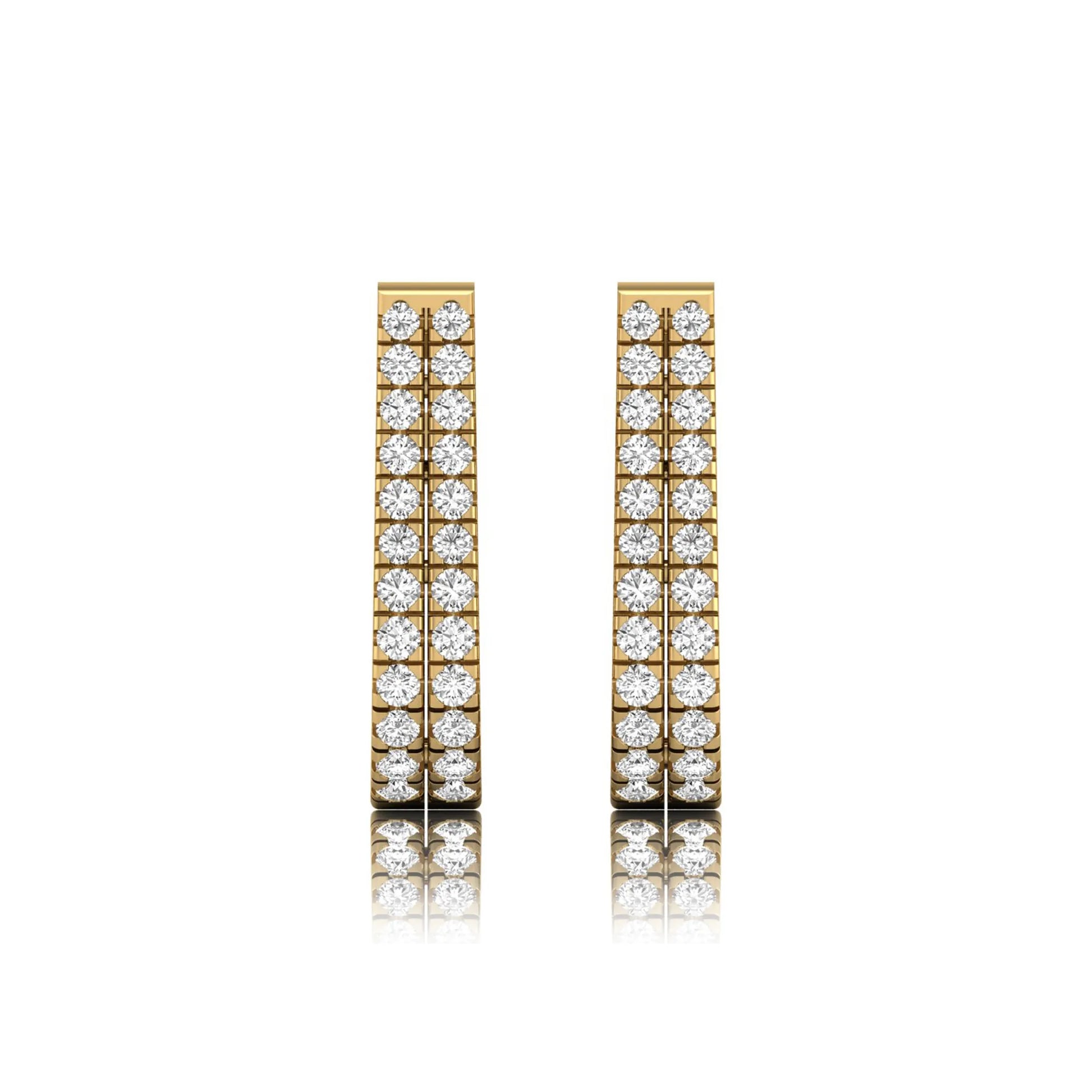 Double row round cut lab grown diamond huggie hoop earrings featuring shared prong set diamonds, hinged snap closure, and polished yellow gold finish.