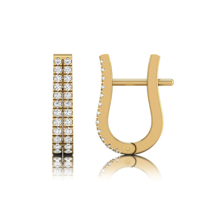 Double row round cut lab grown diamond huggie hoop earrings featuring shared prong set diamonds, hinged snap closure, and polished yellow gold finish.