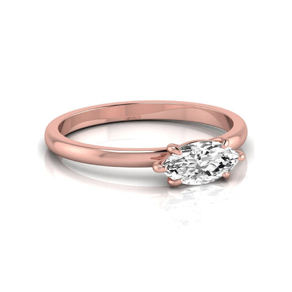 East-west marquise cut lab grown diamond solitaire engagement ring with a six-prong setting in rose gold style.