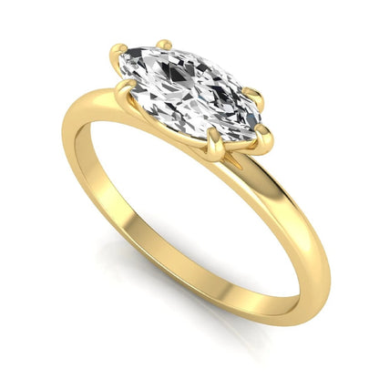 East-west marquise cut lab grown diamond solitaire engagement ring with a six-prong setting in yellow gold style.