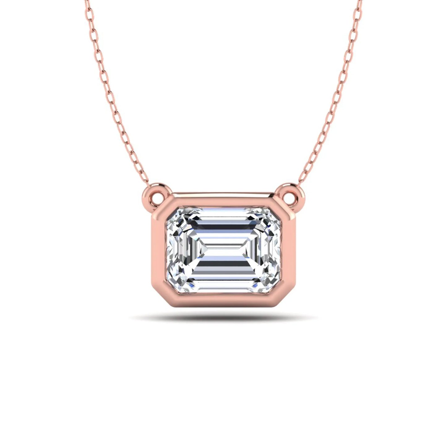 Emerald cut lab grown diamond solitaire pendant necklace with a modern bezel setting in a polished rose gold metal finish.