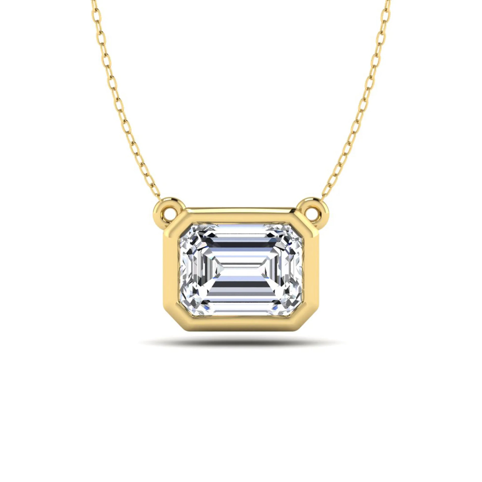 Emerald cut lab grown diamond solitaire pendant necklace with a modern bezel setting in a polished yellow gold metal finish.
