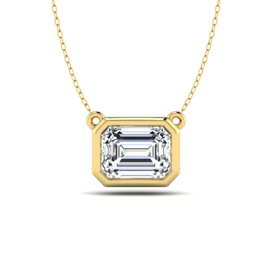 Emerald cut lab grown diamond solitaire pendant necklace with a modern bezel setting in a polished yellow gold metal finish.