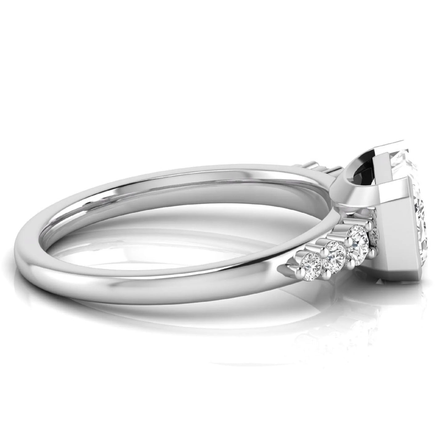 Emerald cut lab grown diamond engagement ring featuring a horizontal east-west bezel-set center diamond with graduated round side diamonds in a white gold tone.