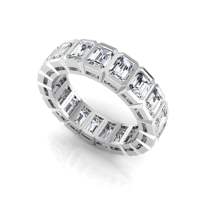 Emerald cut lab grown diamond full eternity band featuring bezel-set diamonds with a white gold tone finish.