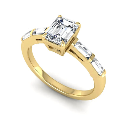 Emerald cut lab grown diamond engagement ring with baguette side diamonds in yellow gold