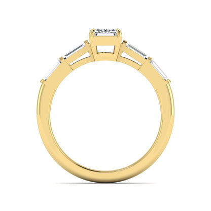 Emerald cut lab grown diamond engagement ring with baguette side diamonds in yellow gold
