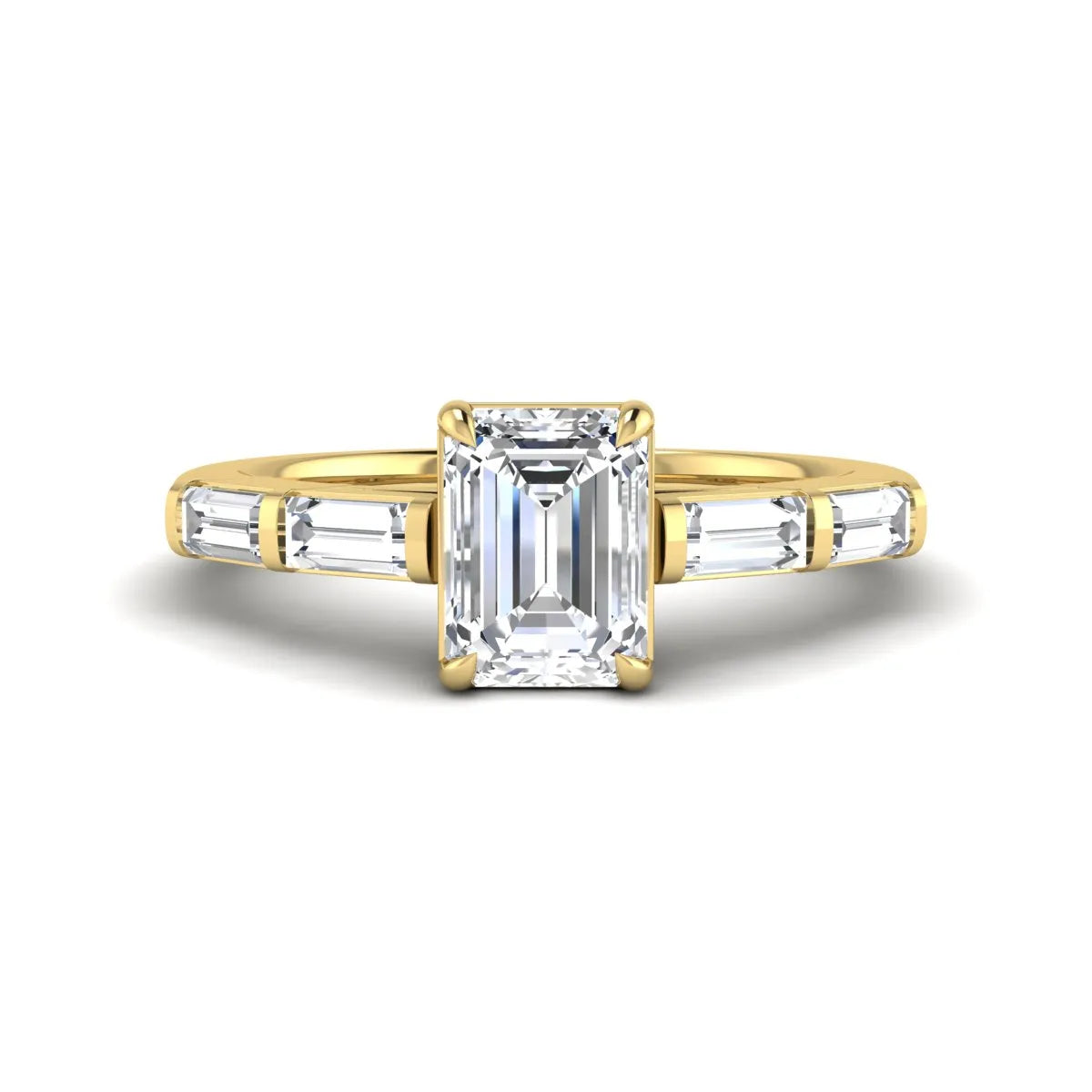 Emerald cut lab grown diamond engagement ring with baguette side diamonds in yellow gold