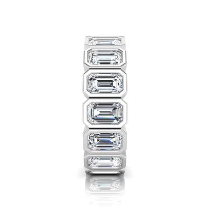 Emerald cut lab grown diamond full eternity ring featuring octagonal bezel-set diamonds in polished white gold.