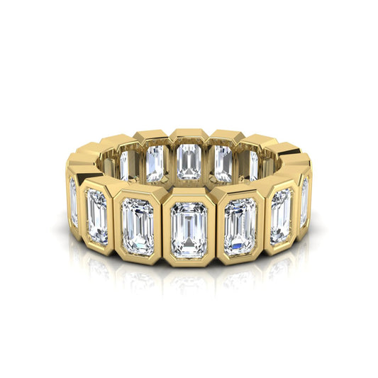 Emerald cut lab grown diamond full eternity ring featuring octagonal bezel-set diamonds in polished yellow gold.