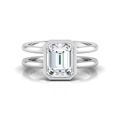 white-gold Diamond ring with emerald-cut gemstone on a white background