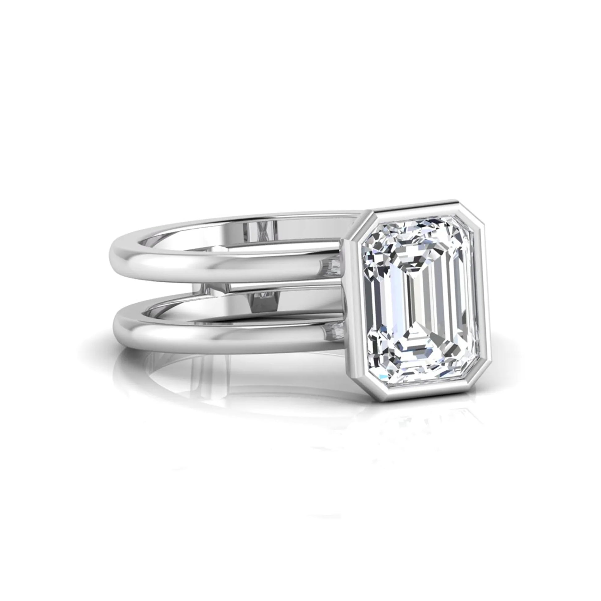 white-gold Diamond ring with emerald-cut gemstone on a white background