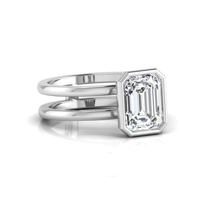 white-gold Diamond ring with emerald-cut gemstone on a white background