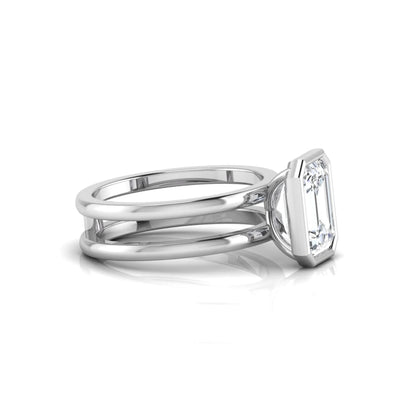 white-gold ring with a diamond on a white background