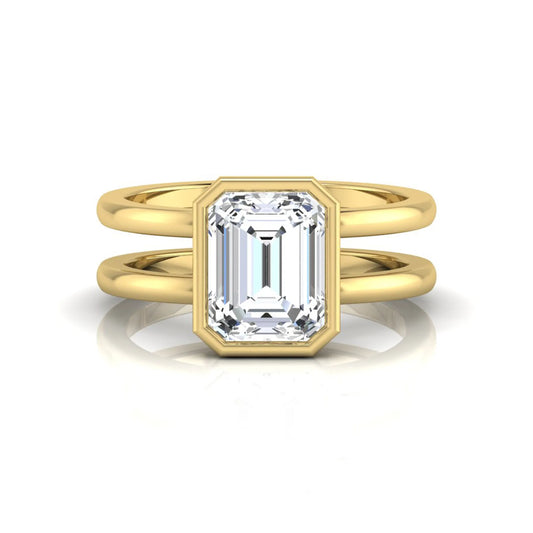 yellow-Gold ring with a rectangular diamond on a white background