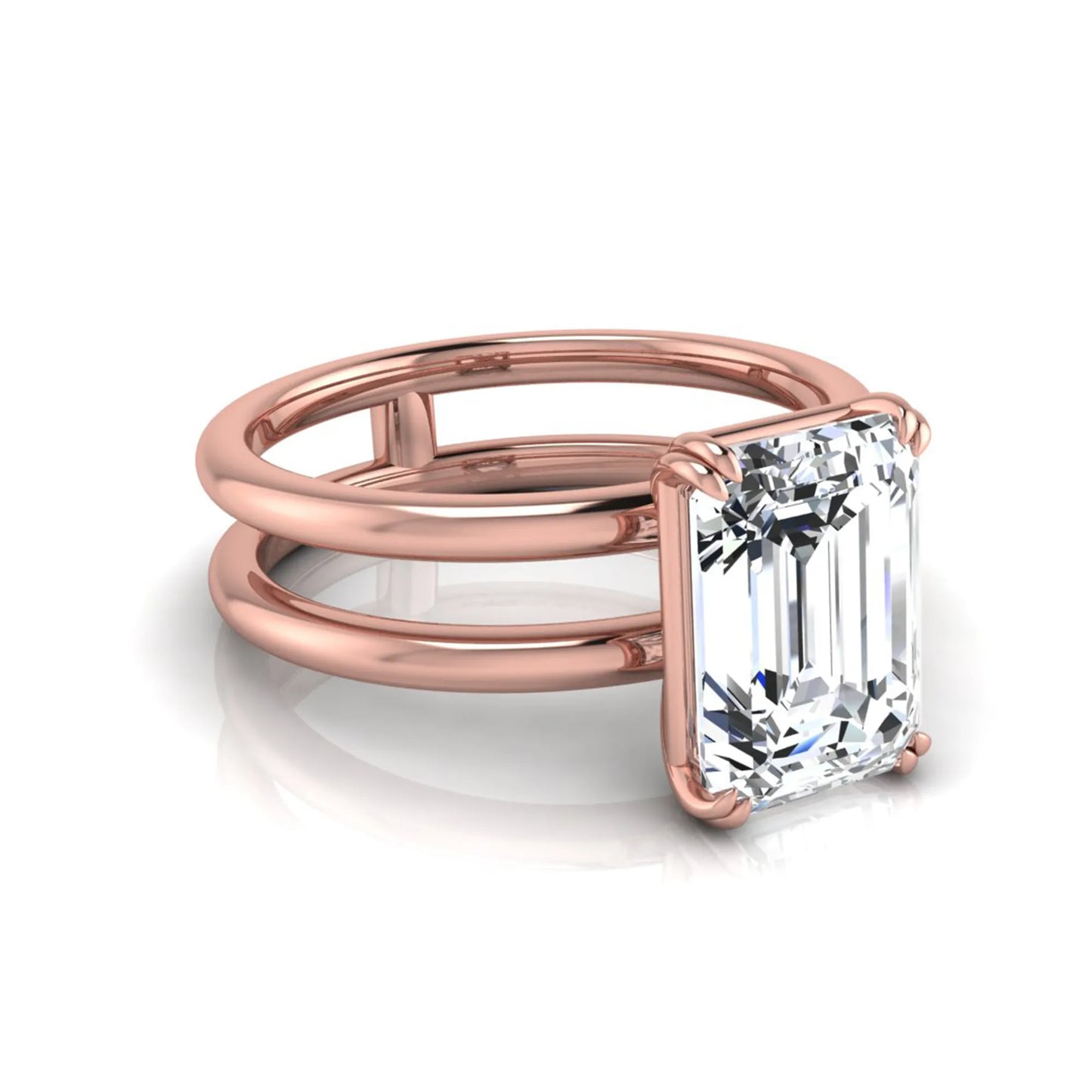 Emerald cut lab grown diamond double band engagement ring featuring a 3.01 carat IGI certified solitaire diamond in a four-prong setting in rose gold