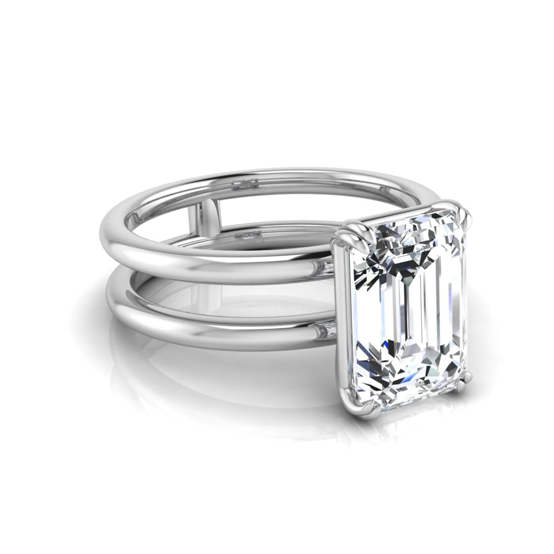 Emerald cut lab grown diamond double band engagement ring featuring a 3.01 carat IGI certified solitaire diamond in a four-prong setting in white gold