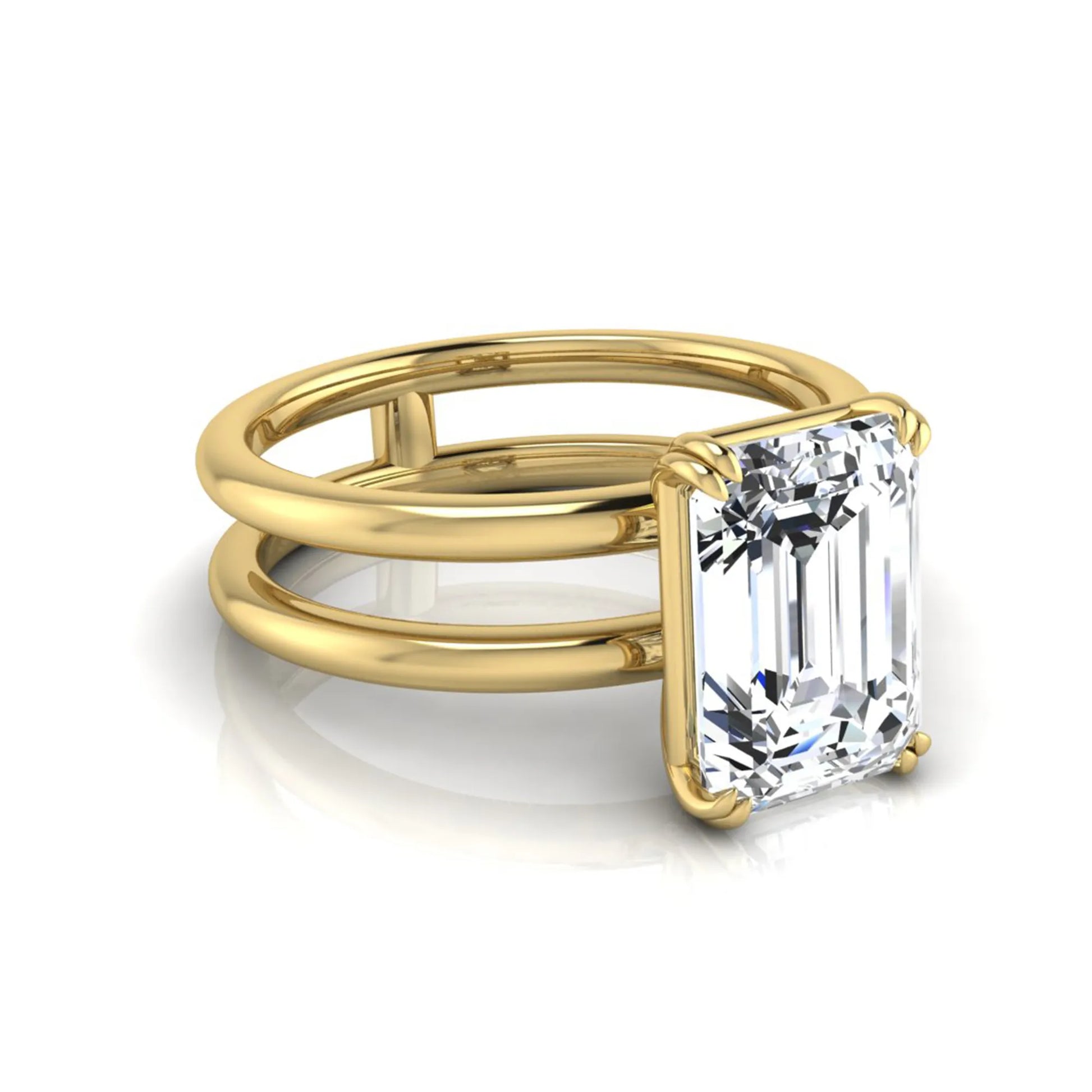 Emerald cut lab grown diamond double band engagement ring featuring a 3.01 carat IGI certified solitaire diamond in a four-prong setting in yellow gold