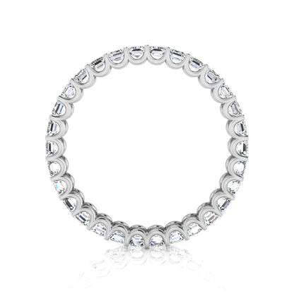 Emerald cut lab grown diamond eternity band featuring a continuous row of shared prong set diamonds in a timeless luxury design in white gold
