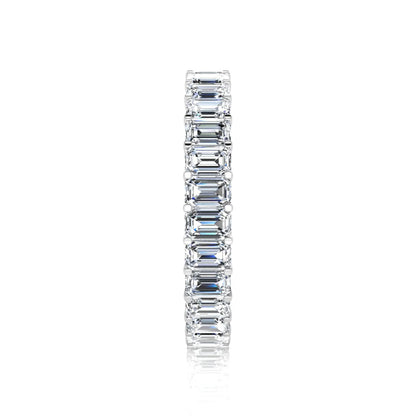 Emerald cut lab grown diamond eternity band featuring a continuous row of shared prong set diamonds in a timeless luxury design in white gold