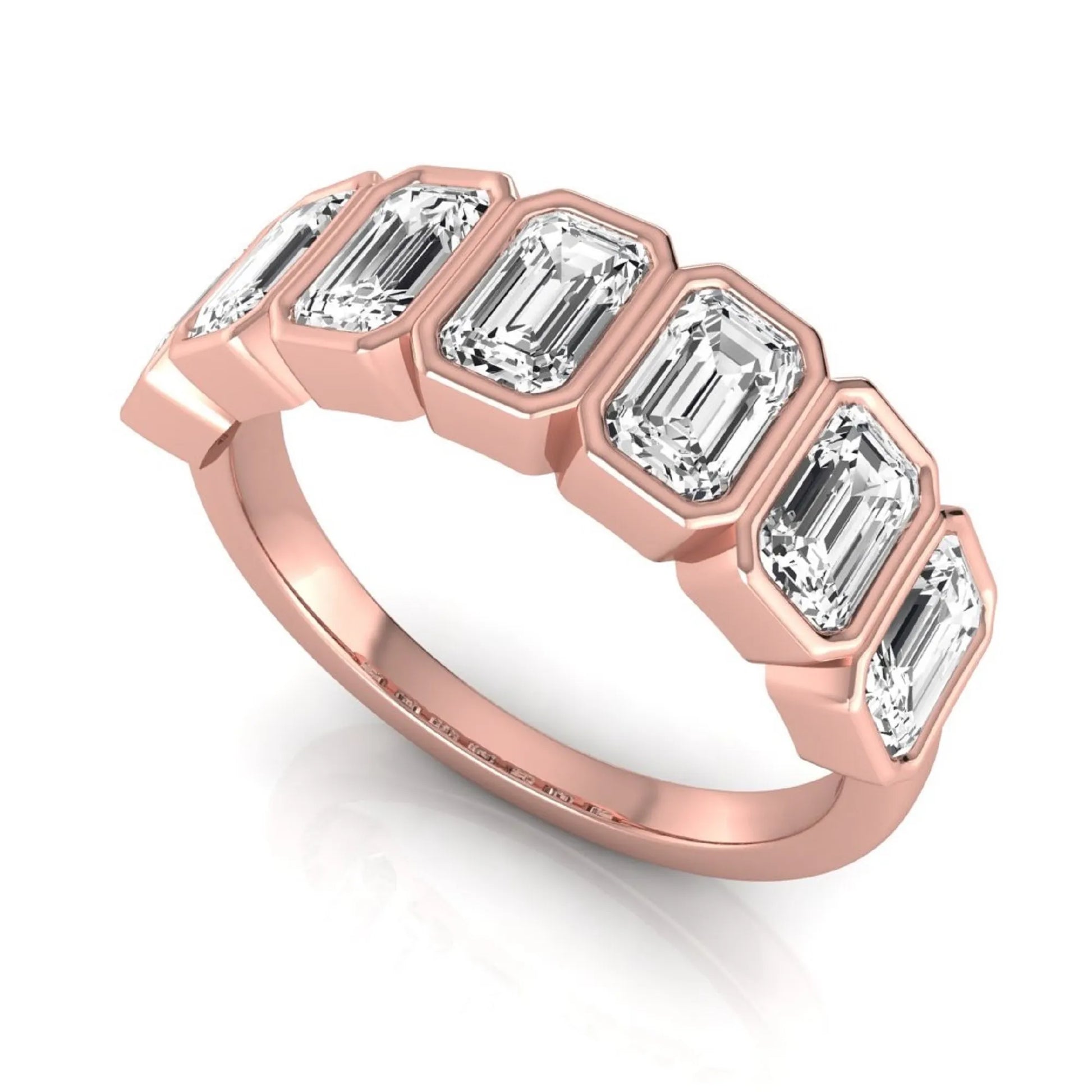 Emerald cut lab grown diamond bezel seven stone band featuring 2.03 carats of bezel set emerald diamonds in rose gold.