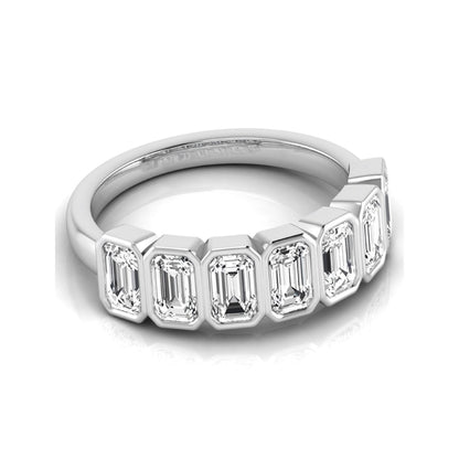 Emerald cut lab grown diamond bezel seven stone band featuring 2.03 carats of bezel set emerald diamonds in white gold.
