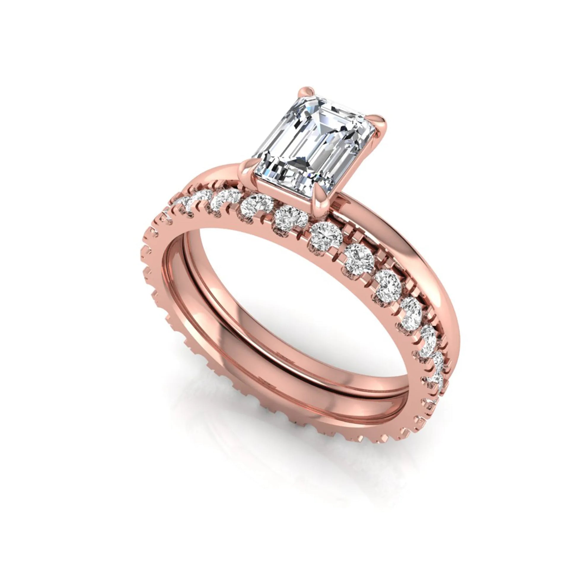Emerald cut lab grown diamond bridal ring set featuring a 1.06 carat IGI certified center diamond with a matching round diamond wedding band in rose gold.