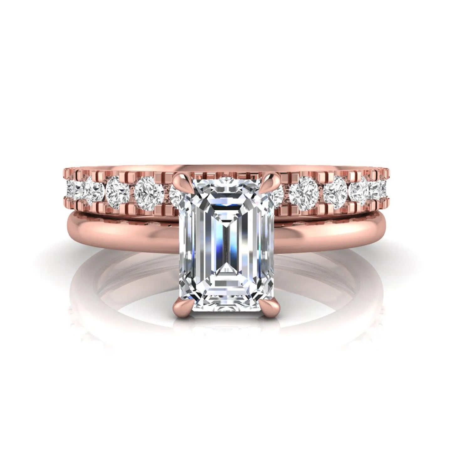 Emerald cut lab grown diamond bridal ring set featuring a 1.06 carat IGI certified center diamond with a matching round diamond wedding band in rose gold.