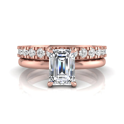 Emerald cut lab grown diamond bridal ring set featuring a 1.06 carat IGI certified center diamond with a matching round diamond wedding band in rose gold.