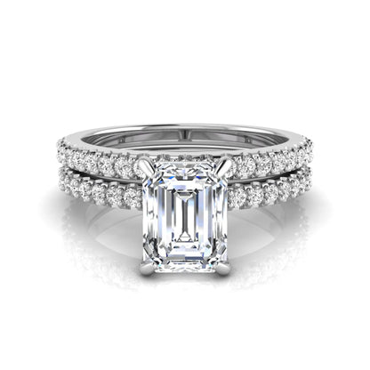 Emerald cut lab grown diamond bridal ring set featuring a 1.74 carat IGI certified emerald cut center diamond with a matching pavé diamond wedding band in white gold