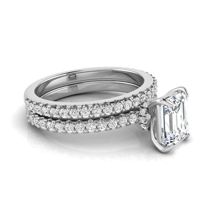 Emerald cut lab grown diamond bridal ring set featuring a 1.74 carat IGI certified emerald cut center diamond with a matching pavé diamond wedding band in white gold