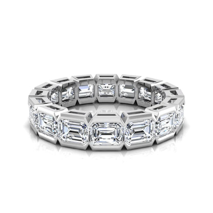 Emerald cut lab grown diamond eternity ring featuring a continuous row of step-cut diamonds in a modern full bezel setting in white gold