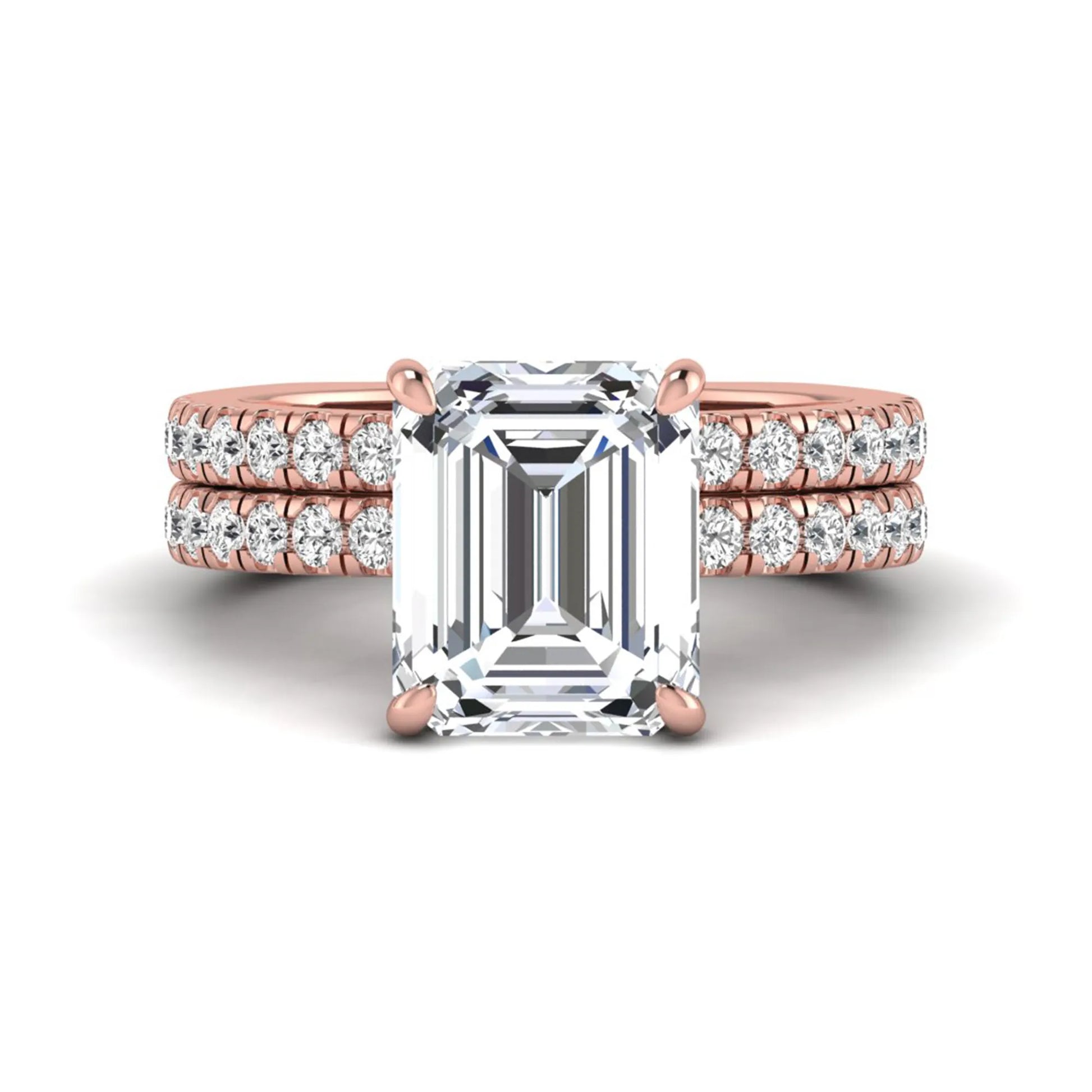 Emerald cut lab grown diamond Euro shank bridal ring set in rose gold featuring a 5.21 carat IGI certified center diamond with matching diamond wedding band.
