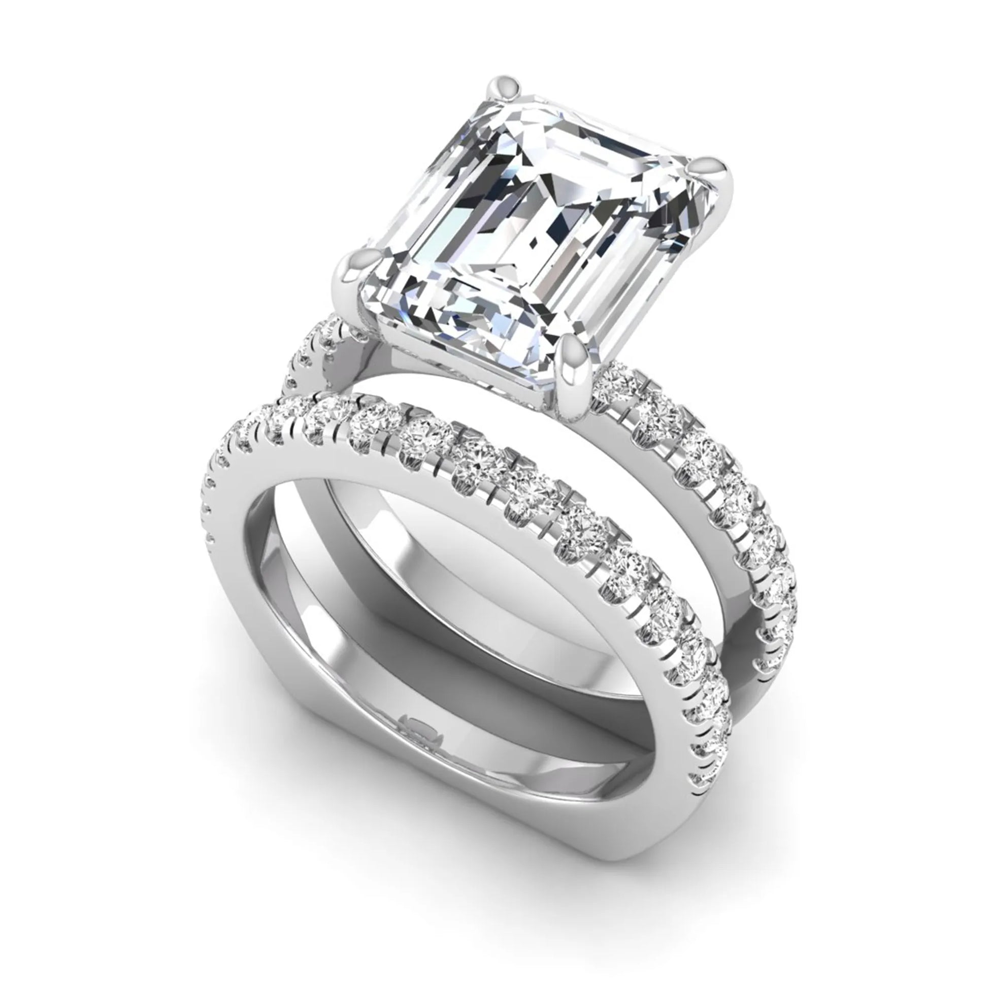 Emerald cut lab grown diamond Euro shank bridal ring set in white gold featuring a 5.21 carat IGI certified center diamond with matching diamond wedding band.