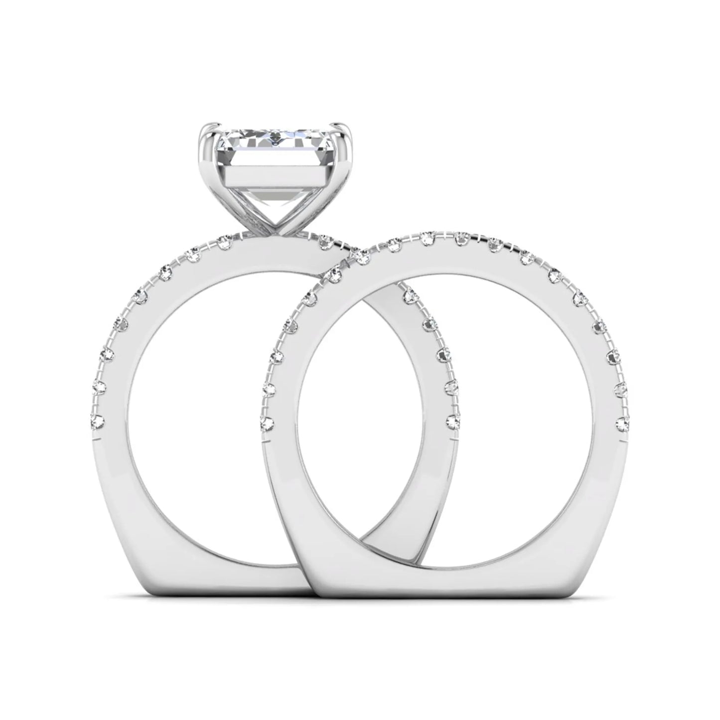 Emerald cut lab grown diamond Euro shank bridal ring set in white gold featuring a 5.21 carat IGI certified center diamond with matching diamond wedding band.