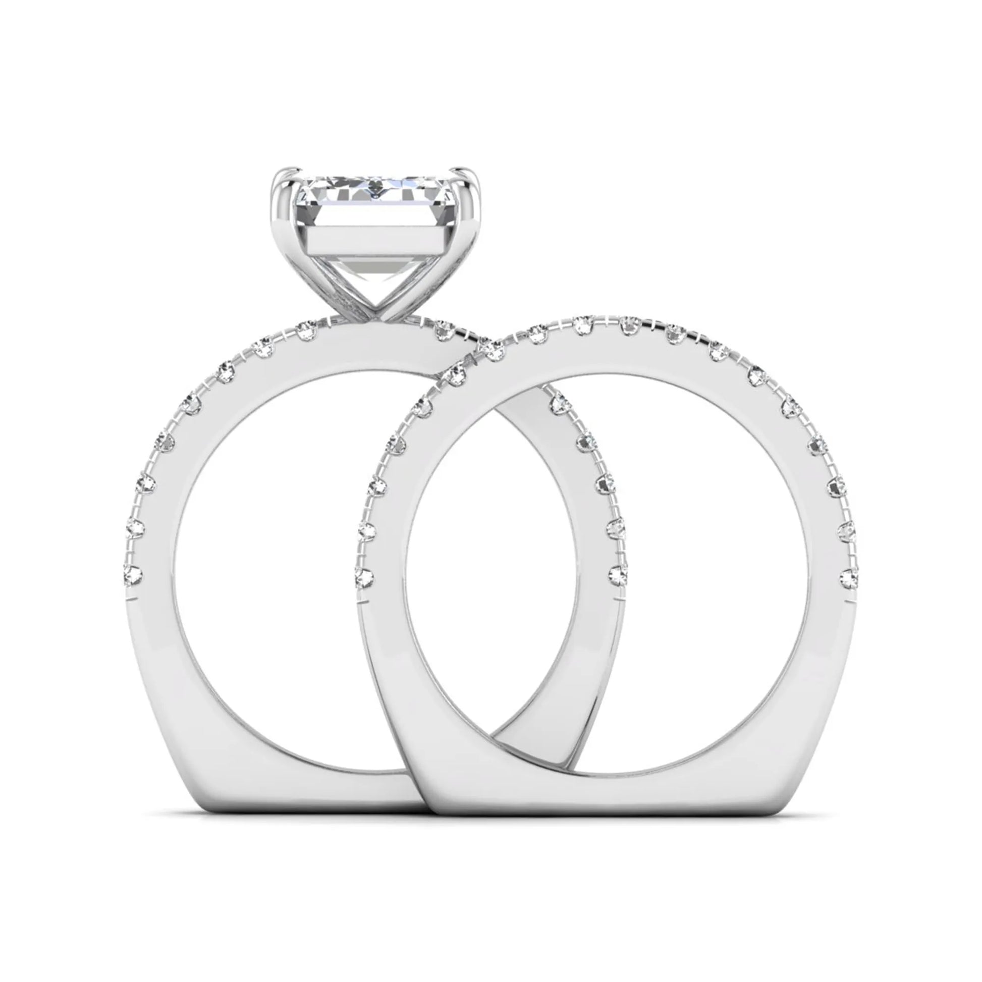 Emerald cut lab grown diamond Euro shank bridal ring set in white gold featuring a 5.21 carat IGI certified center diamond with matching diamond wedding band.
