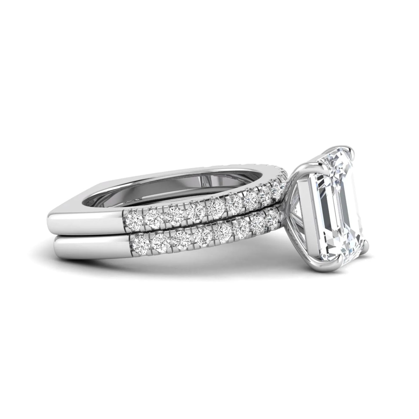Emerald cut lab grown diamond Euro shank bridal ring set in white gold featuring a 5.21 carat IGI certified center diamond with matching diamond wedding band.
