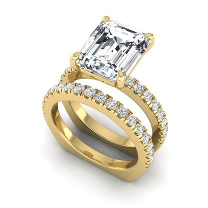 Emerald cut lab grown diamond Euro shank bridal ring set in yellow gold featuring a 5.21 carat IGI certified center diamond with matching diamond wedding band.