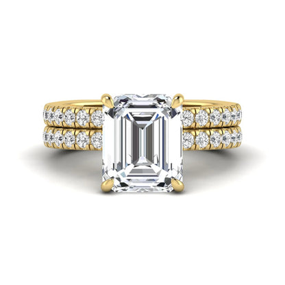 Emerald cut lab grown diamond Euro shank bridal ring set in yellow gold featuring a 5.21 carat IGI certified center diamond with matching diamond wedding band.