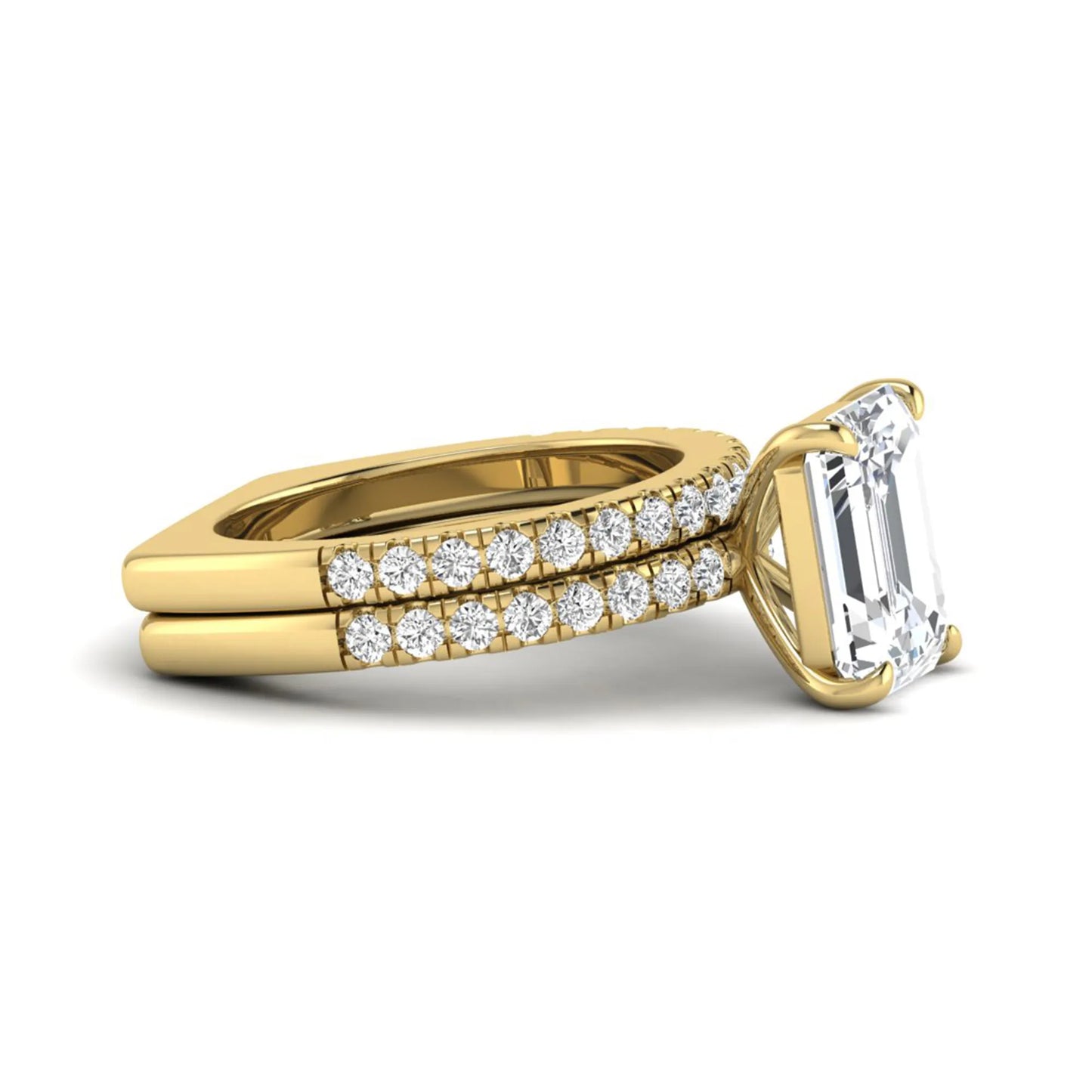 Emerald cut lab grown diamond Euro shank bridal ring set in yellow gold featuring a 5.21 carat IGI certified center diamond with matching diamond wedding band.