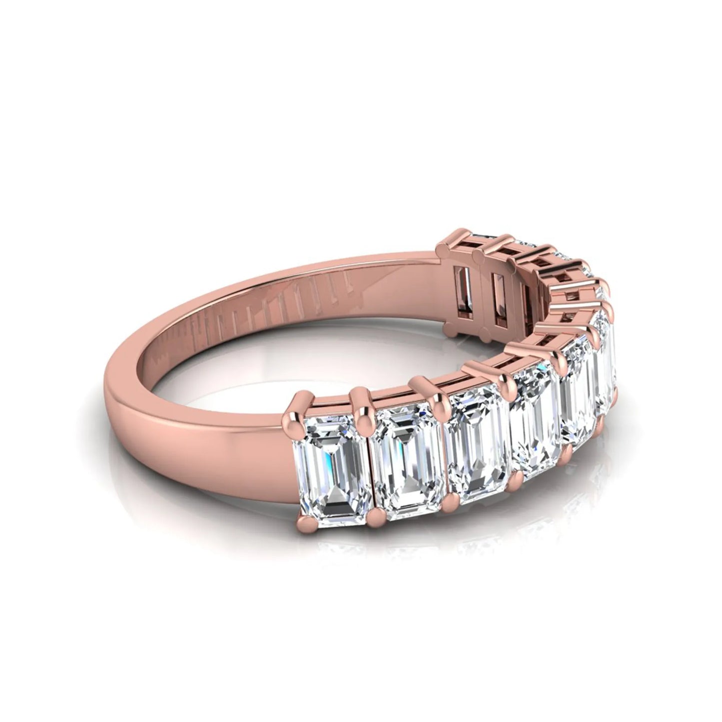 Emerald cut lab grown diamond half eternity band featuring shared prong set diamonds in a rose gold tone finish.