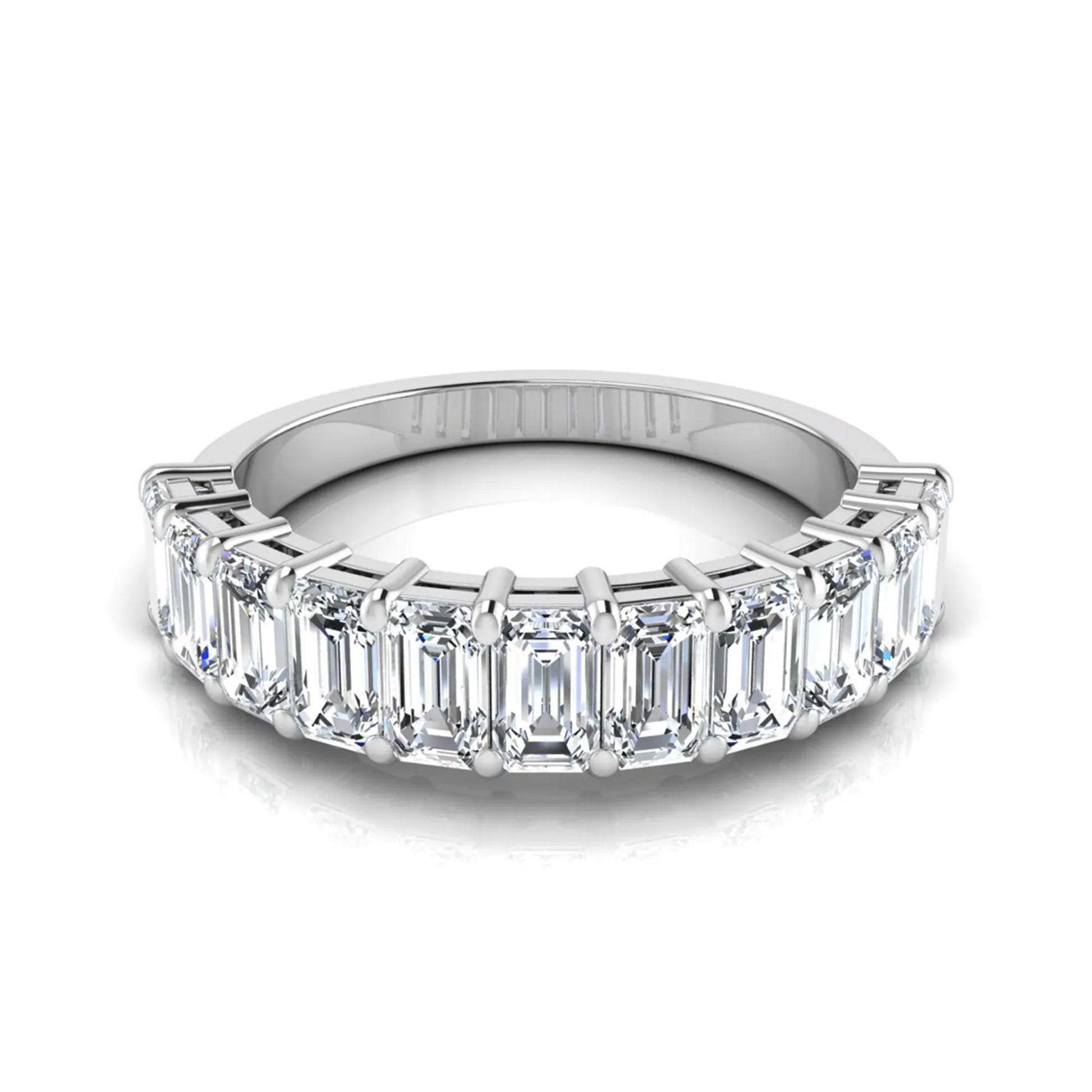 Emerald cut lab grown diamond half eternity band featuring shared prong set diamonds in a white gold tone finish.