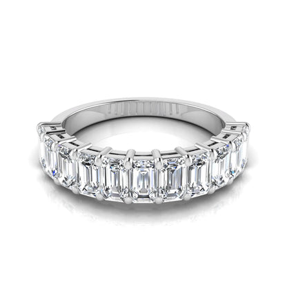 Emerald cut lab grown diamond half eternity band featuring shared prong set diamonds in a white gold tone finish.